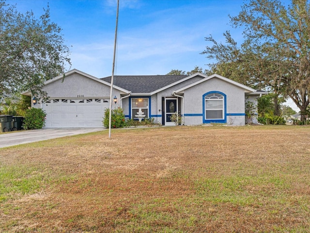 ranch-style home with a front lawn and a garage