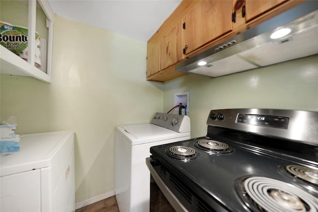 laundry area featuring hardwood / wood-style floors and washer hookup