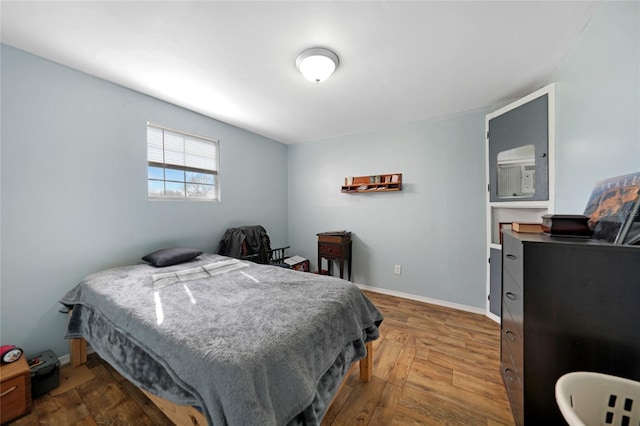 bedroom featuring hardwood / wood-style floors