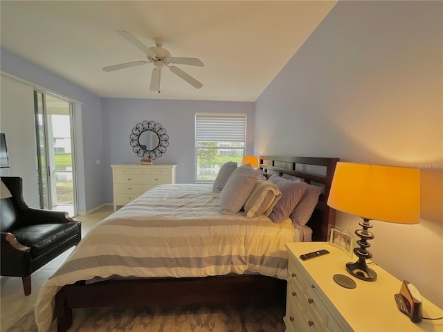 bedroom with multiple windows, carpet flooring, access to outside, and ceiling fan