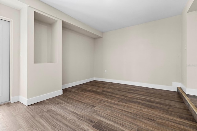 empty room featuring hardwood / wood-style floors