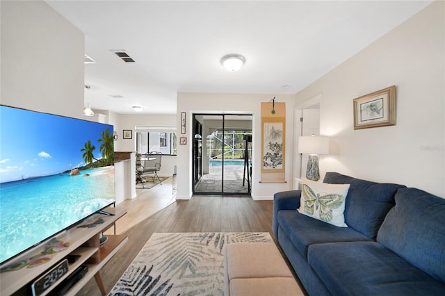 living room with hardwood / wood-style flooring