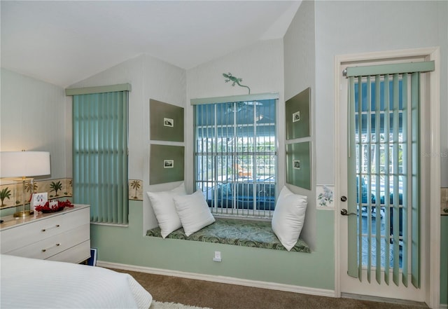 carpeted bedroom featuring vaulted ceiling