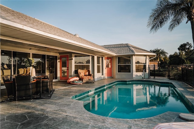 view of swimming pool with outdoor lounge area and a patio