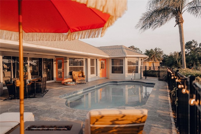 view of swimming pool with a patio