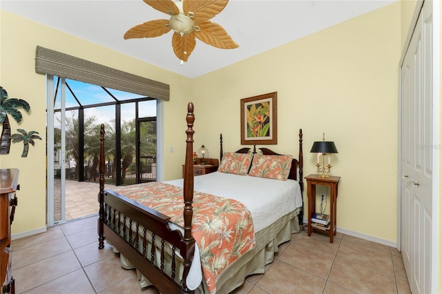 bedroom featuring ceiling fan, light tile patterned flooring, access to outside, and a closet