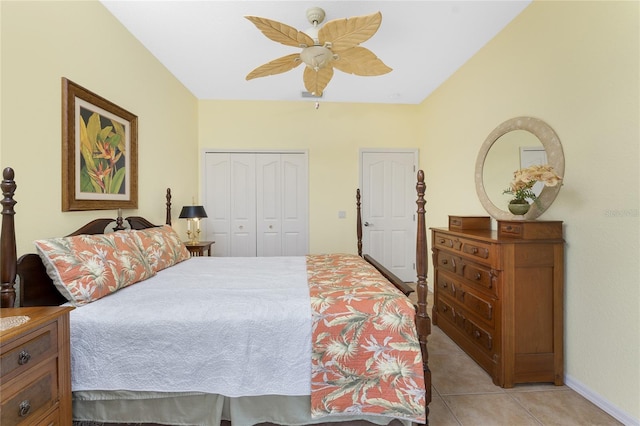 tiled bedroom featuring a closet and ceiling fan