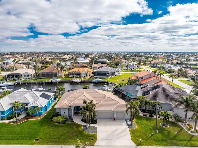 bird's eye view with a water view