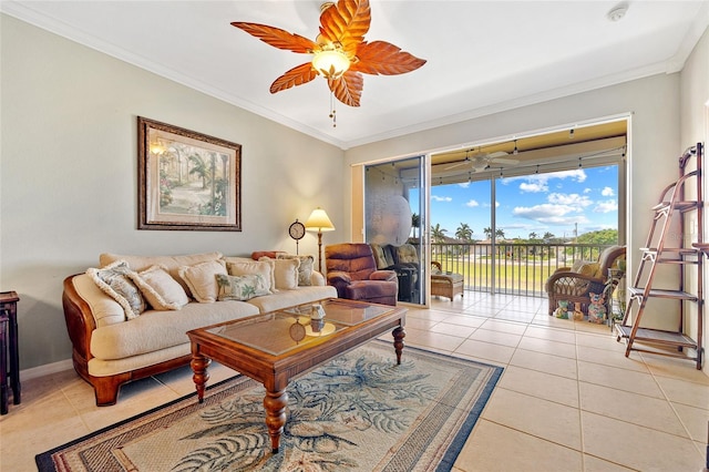 living room with crown molding, light tile patterned floors, and ceiling fan