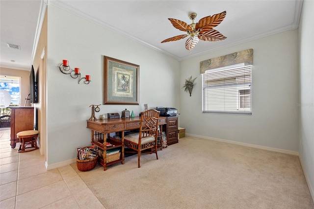 office space with ornamental molding, light tile patterned floors, and ceiling fan