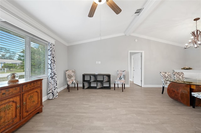 sitting room with ceiling fan with notable chandelier, lofted ceiling with beams, light hardwood / wood-style floors, and ornamental molding