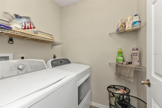 laundry area with washer and clothes dryer