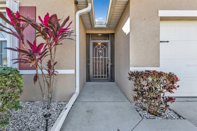 property entrance featuring a garage