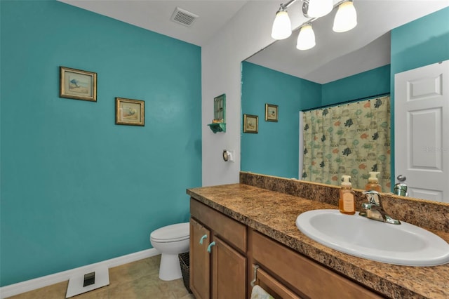 bathroom with toilet, vanity, a shower with curtain, and tile patterned floors