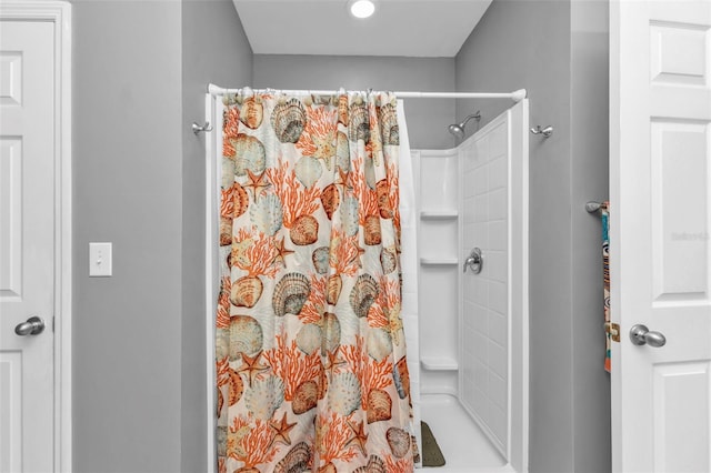 bathroom with a shower with shower curtain