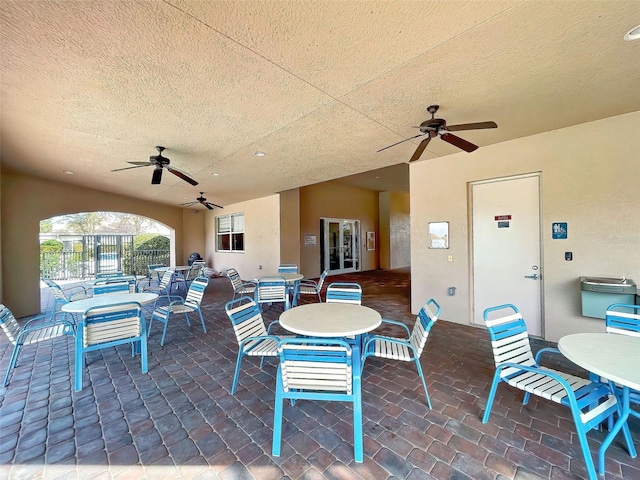 view of patio with ceiling fan