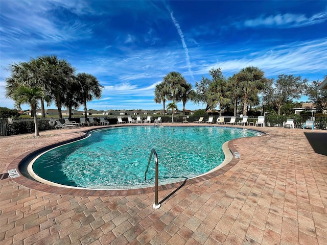 view of swimming pool featuring a patio