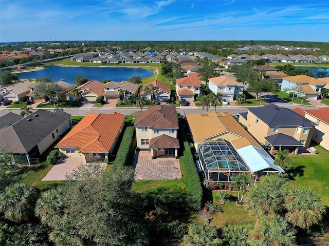 bird's eye view with a water view