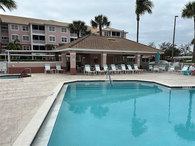 view of swimming pool with a patio area and a gazebo