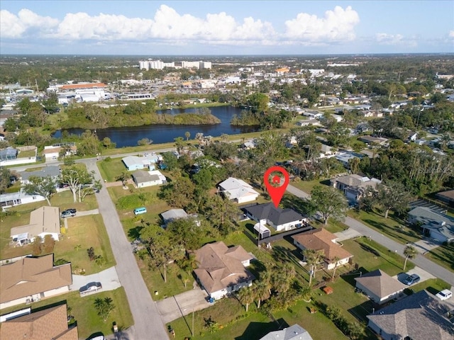 aerial view featuring a residential view and a water view