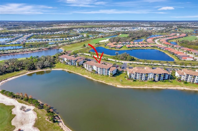 bird's eye view with a water view