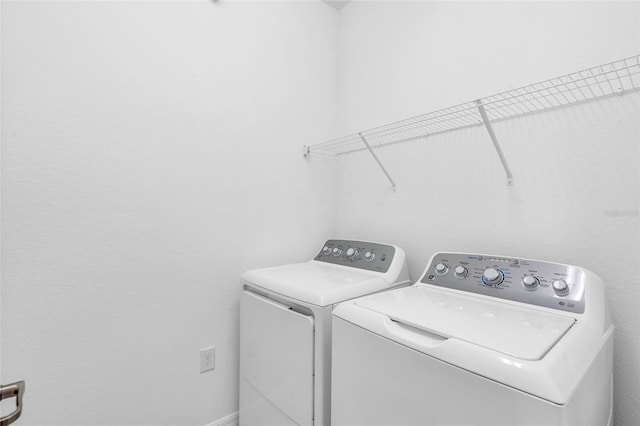 laundry area featuring independent washer and dryer