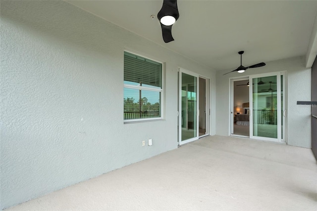 view of patio with ceiling fan