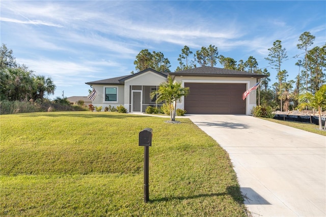 single story home featuring a sunroom, a garage, and a front lawn