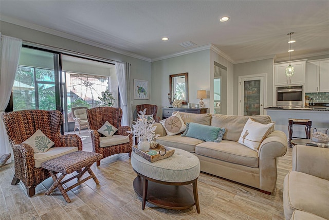 living room featuring crown molding