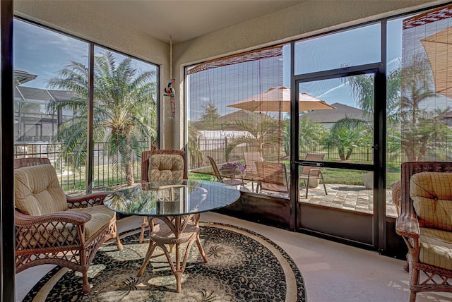 sunroom with plenty of natural light