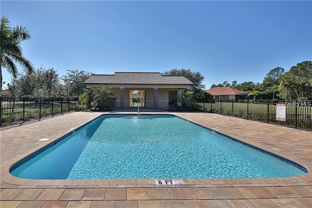 view of pool featuring a patio