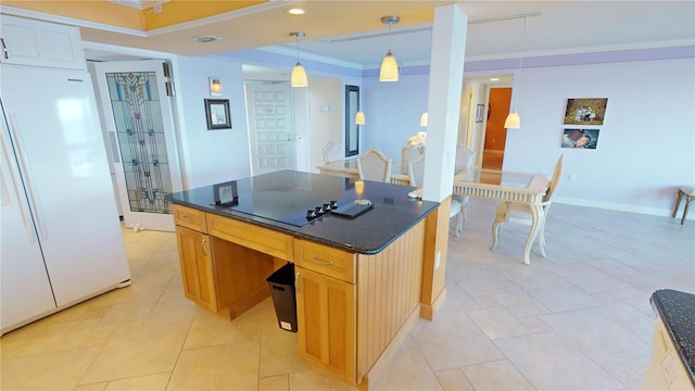 kitchen featuring pendant lighting, a center island, white refrigerator, ornamental molding, and black electric cooktop