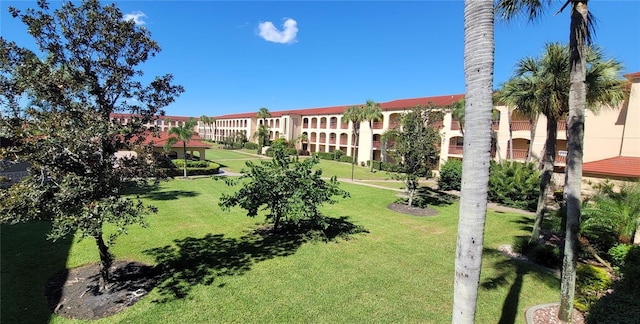 view of community with a lawn