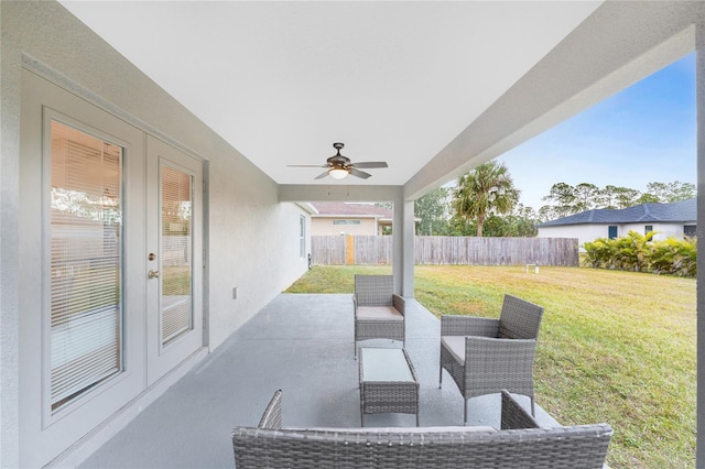 view of patio with ceiling fan