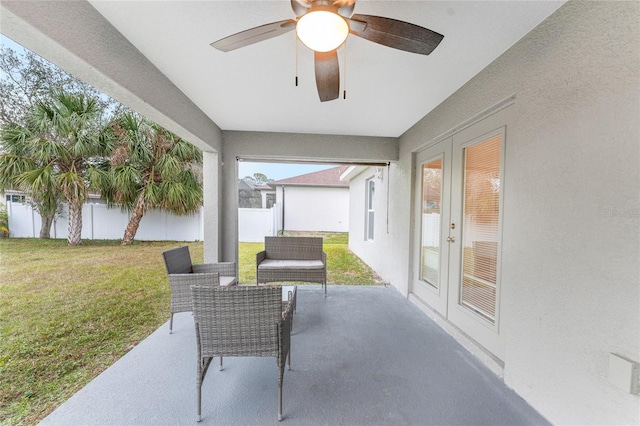 view of patio featuring ceiling fan and french doors