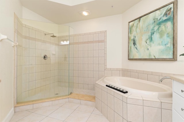 bathroom featuring separate shower and tub and tile patterned floors