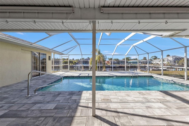 view of pool with a lanai and a patio