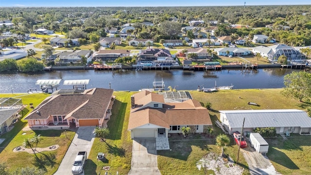 bird's eye view with a water view