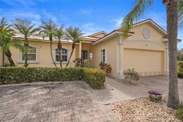 view of front of property featuring a garage