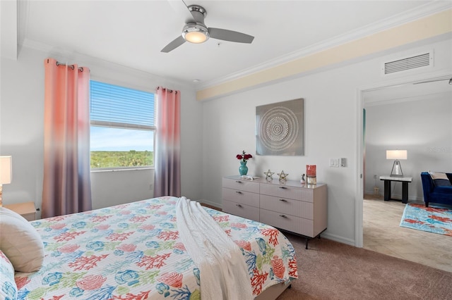 bedroom with ceiling fan, light colored carpet, and ornamental molding