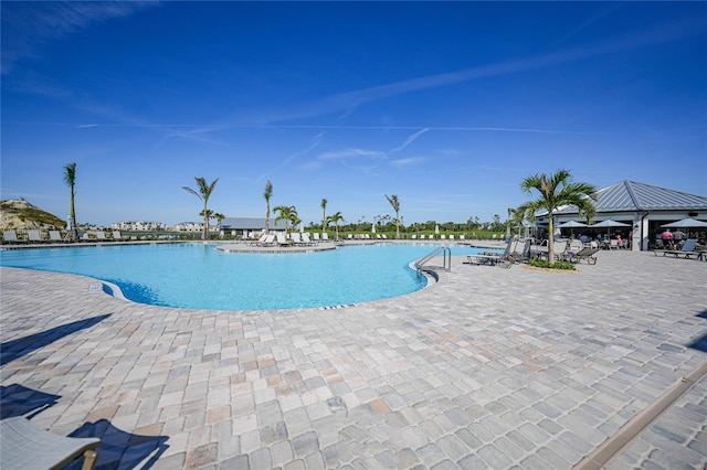 view of pool featuring a gazebo and a patio