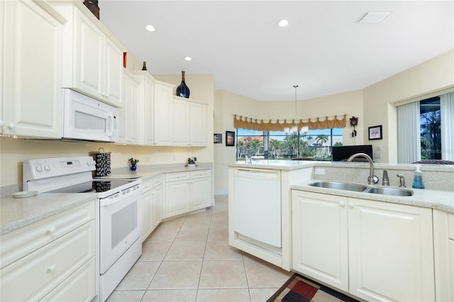 kitchen featuring white cabinets, white appliances, and sink