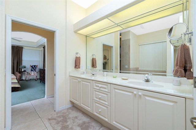 bathroom with tile patterned flooring and vanity