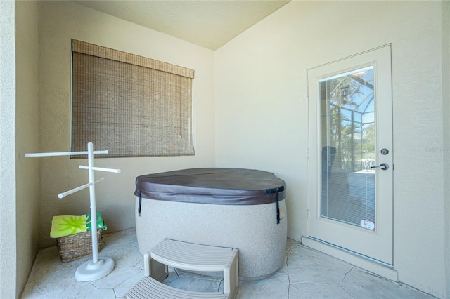 view of patio with a hot tub