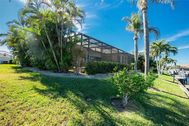 view of yard with a lanai