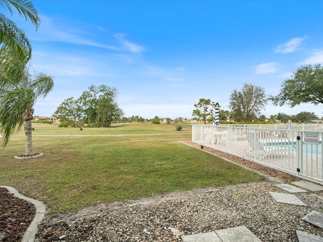 view of yard with a patio and a community pool