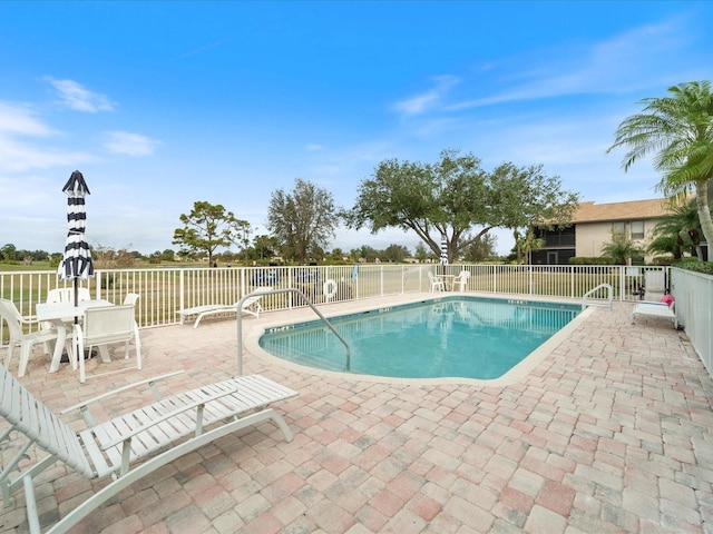 view of pool with a patio