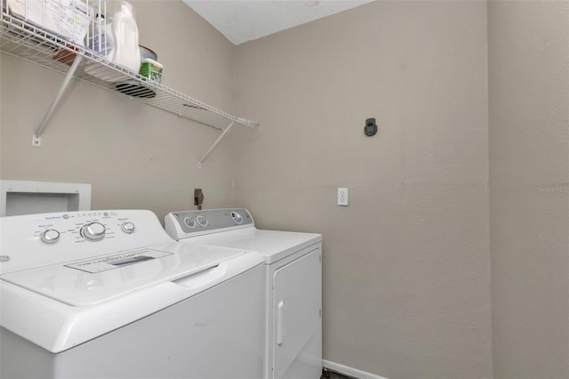 laundry area featuring independent washer and dryer