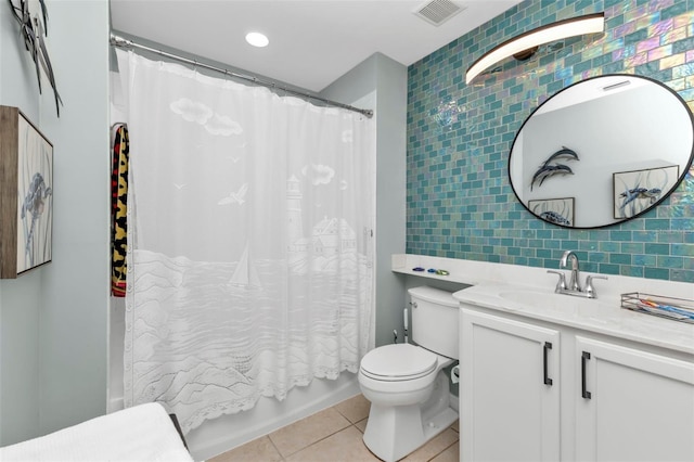 full bathroom featuring shower / bath combo, tile patterned flooring, backsplash, vanity, and toilet