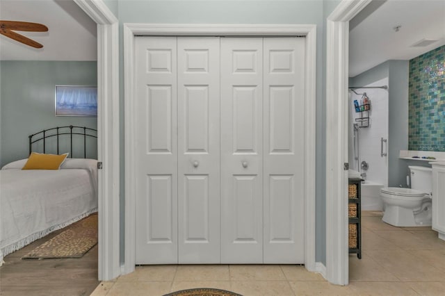 bedroom featuring light tile patterned floors